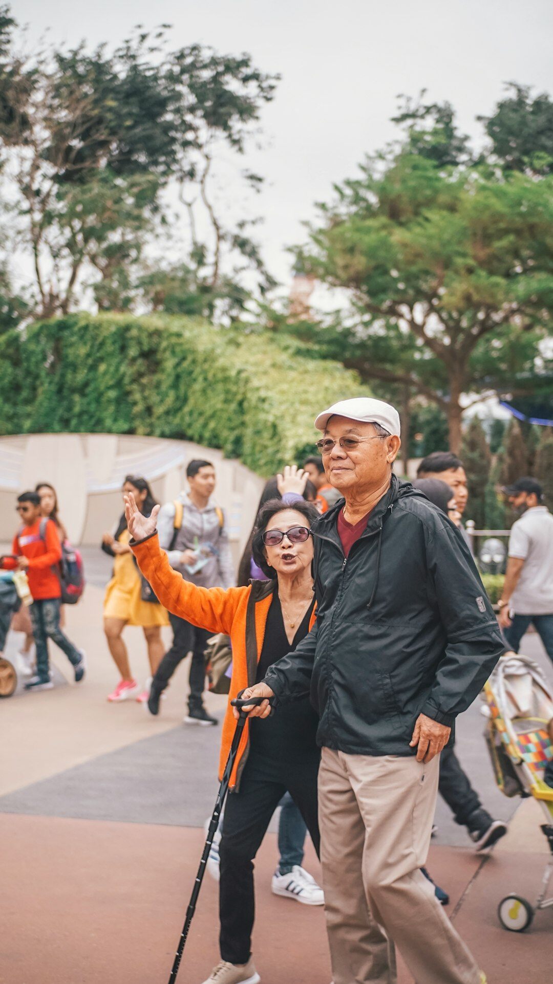 group of seniors walking in park